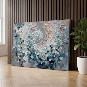 May include: A rectangular canvas painting featuring a dense, textured impasto application of paint. The composition consists of numerous small, overlapping dabs of color in shades of navy blue, teal, light blue, white, soft pink, and grey.