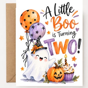 May include: A greeting card featuring a watercolor illustration of a smiling white ghost wearing a witch hat, holding orange and purple balloons. Next to the ghost is a jack-o'-lantern and a cupcake. Text reads: A Little Boo is Turning TWO!