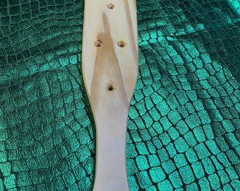 large wooden hand crafted fraternity paddle with holes made of pine wood