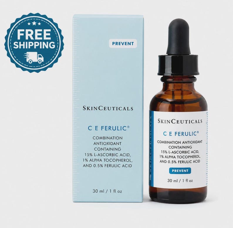 Op de afbeelding: Een huidverzorgingsproductset met een bruine glazen fles met een zwarte druppelaar en een lichtblauwe doos. De fles en doos tonen beide het "SkinCeuticals C E Ferulic" logo en productinformatie. De fles bevat 30 ml.