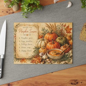 May include: A rectangular glass cutting board featuring a printed illustration of pumpkins, autumn foliage, and a bowl of soup. The text reads Recipe for Pumpkin Season, listing pumpkin spice, cozy sweaters, falling leaves, warm soup, and happy heart.