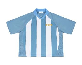 Camiseta de fútbol unisex de malla a rayas y corte holgado.