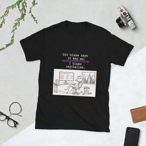 Grappig T-shirt. Git schuld zegt dat ik het was. Ik geef het kapitalisme de schuld