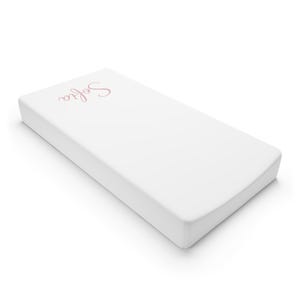 May include: A rectangular white mattress or changing pad featuring the name Sofia printed in a light pink cursive script on the top surface. The item has a smooth, solid white finish with rounded corners and a clean, minimalist rectangular shape.