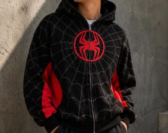 スパイダーマンのグラフィック入りジップアップパーカー Y2K ゴシックパーカー オーバーサイズ ストリートウェアジャケット オルタナティブ グランジ スウェットシャツ ユニセックス スパイダーマンファンへのギフト キッズ
