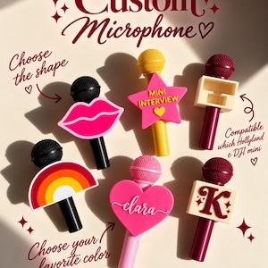 May include: Six custom microphone flags in various shapes and colors. Shapes include a pink lip, a yellow star with 'MINI INTERVIEW' text, a beige square, a rainbow, a pink heart with 'clara' text, and a beige square with the letter 'K'.