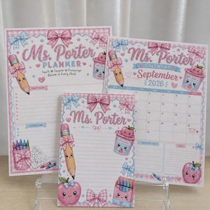 May include: Three printed paper stationery items featuring a pink and blue gingham theme with bows, smiling pencil, apple, and crayon graphics. The text includes Ms. Porter, Planner, Calendar, September 2026, Teach, Inspire, Encourage, and Believe in Every Child.