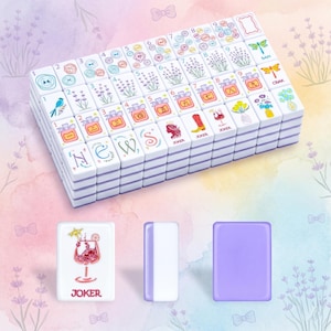 May include: A complete Mahjong set with white tiles featuring colorful illustrations of flowers, birds, and other symbols. The set includes tiles with the word "JOKER" and numbers. The background is a watercolor wash of lavender and purple.