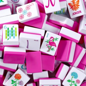 May include: A collection of Mahjong tiles featuring white faces with colourful illustrations including a pink flamingo, a rose, a hydrangea, bamboo stalks, and a bee labelled JOKER. The tiles have vibrant pink backs and sides, arranged in a scattered pile.