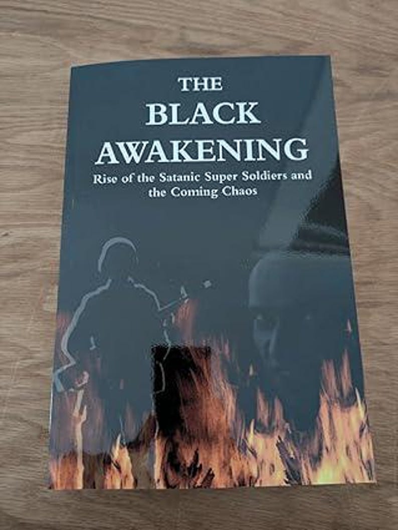 May include: A book titled "The Black Awakening" with the subtitle "Rise of the Satanic Super Soldiers and the Coming Chaos." The cover features a dark background with silhouettes of soldiers and flames.