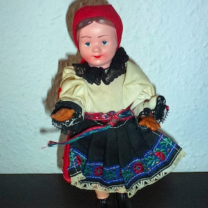 vintage decorative dolls in traditional costume