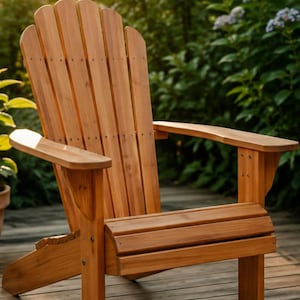 May include: A natural wood Adirondack chair featuring a tall, curved backrest with vertical slats, wide flat armrests, and a low, slanted seat. The chair is constructed from light brown timber with visible wood grain and metal hardware fasteners.
