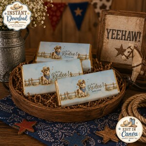 May include: Three rectangular chocolate bar wrappers featuring a watercolour illustration of a pony wearing a cowboy hat and blue bandana. The text reads My 1st Rodeo! Justin is one! The design includes a wooden fence and a light blue sky background.