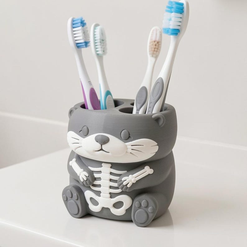 Skeleton Otter Toothbrush Holder, 3D Printed Spooky Bathroom Decor, Unique Hand-Painted Vanity Organizer for One Toothbrush image 3