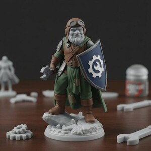 May include: A miniature figurine of a fantasy character, a dwarf, holding a wrench and shield. The dwarf wears a brown leather vest, green tunic, and goggles. The shield is blue with a white gear symbol. The figurine is on a rocky base.