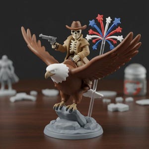 May include: A figurine of a skeleton cowboy riding a brown eagle, holding a gun. The eagle is perched on a gray rock base. The cowboy wears a brown hat and coat. A firework display is held in the eagle's other claw.