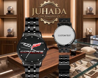 May include: A black wristwatch with a metal link band featuring a Corvette Racing logo on the dial. The dial has a textured black background with silver hour markers and hands. A second watch case is shown with a white back labeled CUSTOM TEXT.