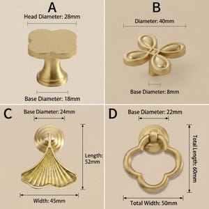 May include: Four gold-toned metal cabinet knobs labeled A, B, C, and D. Knob A has a 28mm head and 18mm base. Knob B has a 40mm diameter and 8mm base. Knob C is a fan-shaped pull with a 24mm base, 45mm width, and 52mm length. Knob D is a ring pull with a 22mm base, 50mm width, and 60mm length.