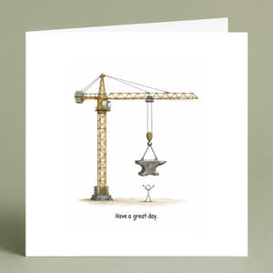 Puede incluir: Tarjeta de felicitación con una grúa amarilla que levanta un yunque gris. Un hombre de palitos está de pie debajo con los brazos levantados. El texto "Have a great day" está impreso en la parte inferior.