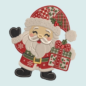 May include: An embroidered patch of a smiling Santa Claus wearing a red hat with white trim and holly accents. Santa has a white beard, a red coat with a green belt and gold buckle, and black boots. Santa holds a green and red gift box with a bow.