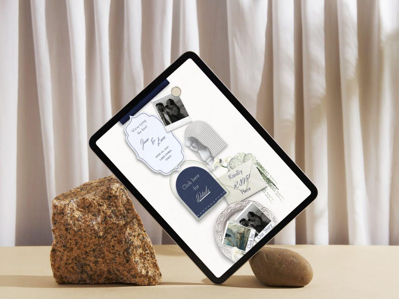 May include: A digital tablet displaying a wedding invitation template with a white background, featuring a navy blue arch button labelled Click here for Details, a cream envelope labelled Kindly RSVP Here, and various black and white photos.