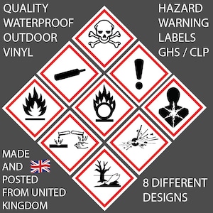 May include: A collection of eight diamond-shaped hazard warning labels printed on waterproof outdoor vinyl. The labels feature black GHS and CLP pictograms on white backgrounds with red borders, including symbols for toxicity, flammability, and environmental hazards.