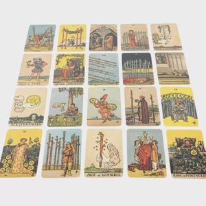 May include: A collection of twenty tarot cards arranged in a grid, featuring various illustrations including the Page of Cups, Queen of Pentacles, Ace of Pentacles, Ace of Wands, and King of Pentacles, each with distinct vintage-style artwork and muted colors.