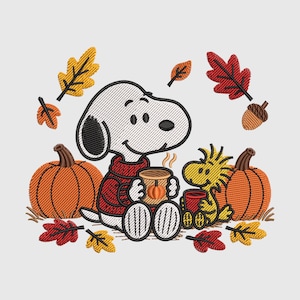 May include: An embroidery design featuring a white beagle wearing a red sweater and a yellow bird sitting together. They are surrounded by orange pumpkins, an acorn, and scattered autumn leaves in shades of red, yellow, and orange.