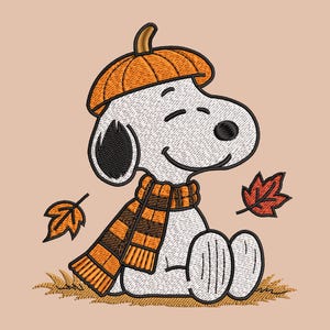 May include: An embroidery design of a white beagle with a black ear, wearing an orange pumpkin-shaped hat and a brown and orange striped scarf. The character is sitting on a patch of brown leaves with two falling autumn leaves on the sides.