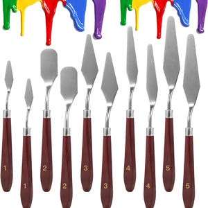 May include: A set of ten painting palette knives with silver metal blades and dark brown wooden handles. Each handle is numbered from one to five. The blades vary in shape, including pointed, rounded, and rectangular tips, arranged vertically.