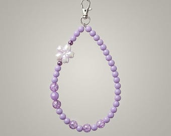 LILA - Paarse kralen en kersenbloesem telefoonhanger - pastelkleurige polsband - lichtgevende sleutelhanger - trendy cadeau