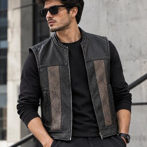 Black Leather Vest With Python Panel. Slash Pockets & Exotic Print.