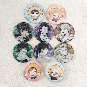 May include: A collection of ten circular pin-back badges featuring anime-style character illustrations. Four badges display characters in fish-shaped hats, while six badges show detailed portraits of various characters with distinct expressions and backgrounds.