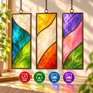 May include: Three rectangular stained glass panels with metal frames and hanging chains. Each panel features a wavy design with three distinct color sections: white, teal, and green; yellow, cream, and orange; and purple, pink, and green.