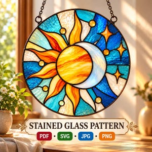 May include: A circular stained glass sun and moon design featuring a central yellow and orange sun overlapping a white crescent moon. The background consists of blue and white glass segments with yellow star accents and small circular glass beads.