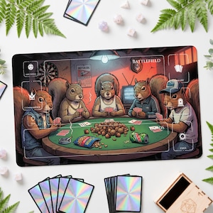 May include: A rectangular playmat featuring a colorful illustration of five squirrels playing cards around a round green table. The scene includes a pile of nuts, a bag of Planters peanuts, and a soda can. The mat has white game zone labels.