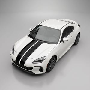 May include: A white two-door sports coupe featuring two bold black racing stripes running down the center of the hood. The vehicle has dark grey alloy wheels, a sleek aerodynamic body design, and a shark fin antenna on the roof.