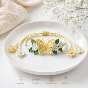May include: A yellow crochet butterfly bracelet featuring white and yellow crocheted flowers with small white pearls at their centers and green crocheted leaves. The bracelet has an adjustable yellow cord with dangling flower charms at the ends.