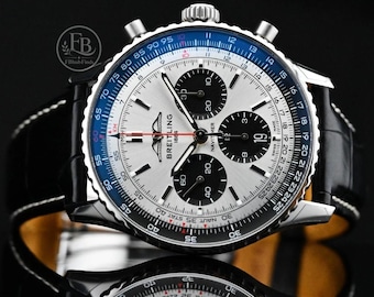 Reloj de lujo Breitling Navitimer para hombre / Esfera de cronógrafo plateada / Correa de cuero negro / Reloj de pulsera clásico de aviación