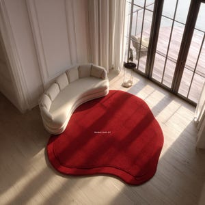Onregelmatig dieprood vloerkleed - abstracte amorfe wollen vloermat - moderne ovale rode loper