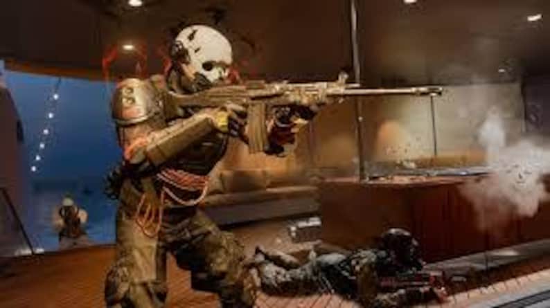 May include: A soldier in tactical gear, including a helmet and body armor, aims a rifle. The scene is set in a modern, indoor environment with a futuristic aesthetic. Another soldier is on the ground, and a third is in the background.