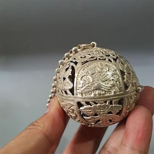 Esfera de incienso colgante chapada en plata de estilo vintage, difusor tradicional chino.
