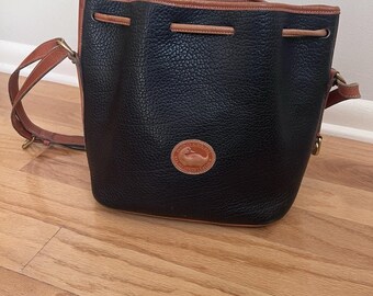 Dooney & Bourke AWL Black Pebbled Leather Drawstring Bucket Bag Tassel Strap