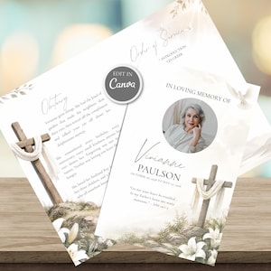 May include: A funeral programme template featuring a wooden cross draped in white fabric, white lilies, and a circular photo frame. The text includes "In Loving Memory Of," "Vivianne Paulson," "Obituary," and "Order of Service" with a Canva edit button.