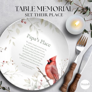 May include: A white ceramic plate featuring a red cardinal bird perched on a branch, surrounded by watercolor leaves and berries. The text reads Papa's Place, a poem about remembrance, and Always Remembered, Forever Loved.
