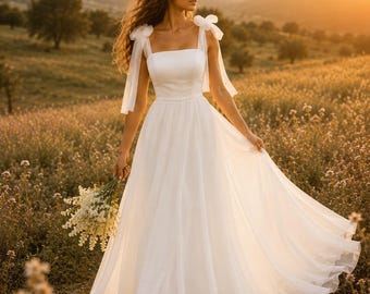 Vestido de noiva simples, vestido de noiva minimalista, vestido de noiva boho, vestido de noiva com decote quadrado, vestido de noiva em tule estilo A, vestido de noiva para casamento no jardim