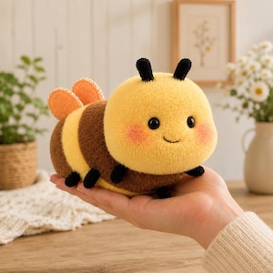 May include: A plush bee toy with a yellow head, brown and yellow striped body, and orange wings. The bee has a smiling face with rosy cheeks and black antennae and feet. The toy is designed to look like a cartoon bee.