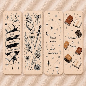 May include: Four rectangular bookmarks with a light tan background. The first features open books and a banner reading one more chapter. The second shows a flaming heart, a sword, bows, and flowers. The third displays stars, moons, and fated mates & bad decisions. The fourth shows various books and booked & busy.