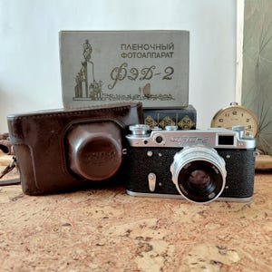 Cámara de cine soviética vintage FED 2 en funcionamiento con objetivo Industar-26 m, cámara antigua de 35 mm de la URSS, idéntica a la Leica Thread, rosca M39