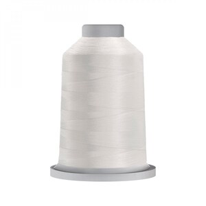 May include: A white spool of thread on a white plastic bobbin.
